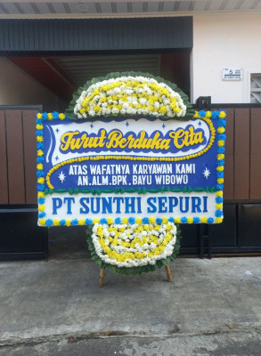 Papan Bunga Duka di Isola