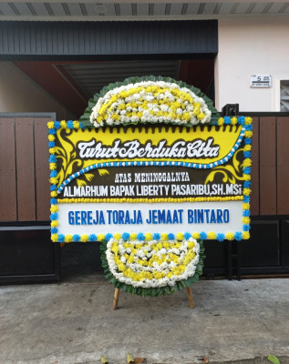Papan Bunga Duka di Isola