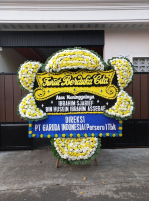 Papan Bunga Duka di Isola