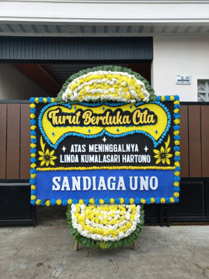Papan Bunga Duka di Isola